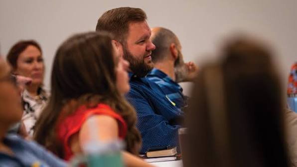 People attending an adult discipleship class