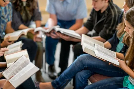Small group studying the Bible together